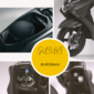 Suzuki Burgman Street 125 de color negro, con diseño moderno y detalles en rojo, mostrando su motor y ruedas
